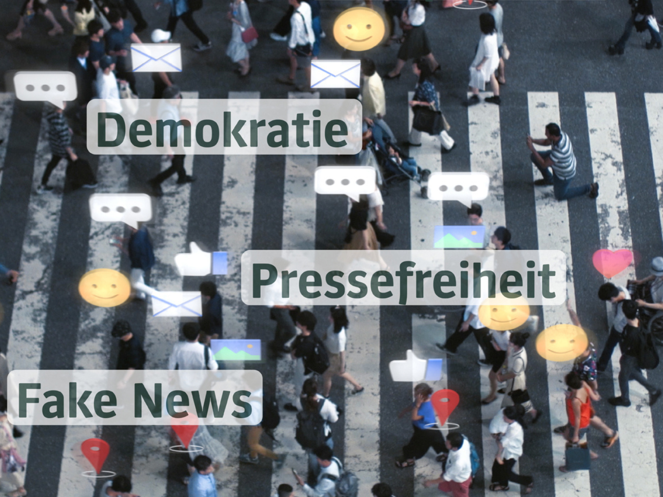 Menschen mit Handy in der Hand laufen über einen Zebrastreifen. Man sieht Sprechblasen mit den Wörterm: Fake News, Demokratie und Pressefreiheit.